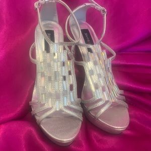 Jenanne Beker size 8 silver heels with unique glass like jewls. Ankle straps